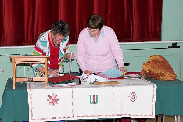 Merril and Janice checking the agenda.jpg